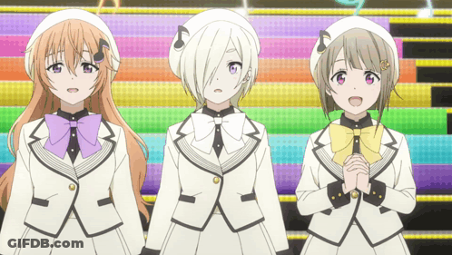 Three Anime Girls Are Standing Next To Each Other In Front Of A Rainbow Background GIF