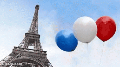 Three Balloons Are Flying In Front Of The Eiffel Tower In Paris GIF