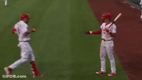 Three Baseball Players On Field GIF