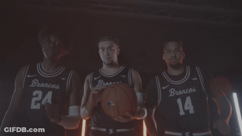 Three Basketball Players In Brancos Jerseys GIF