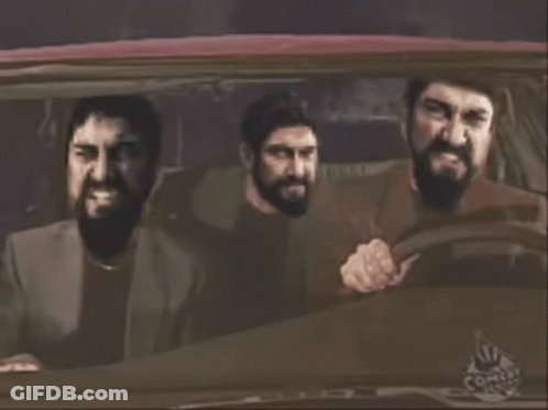 Three Bearded Men In A Car With Comix Logo GIF
