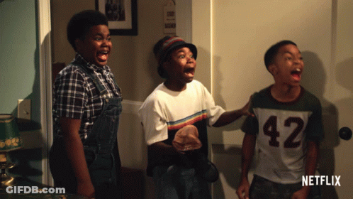Three Boys Standing In Front Of Netflix Door GIF