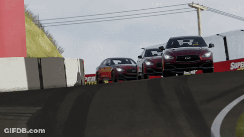 Three Cars Are Driving Down A Race Track With A Super Tires Sign In The Background GIF