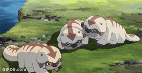 Three Cartoon Animals With Arrows On Their Heads Are Standing In The Grass GIF