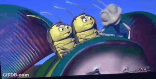 Three Cartoon Bugs Are Sitting On Top Of A Green Object GIF