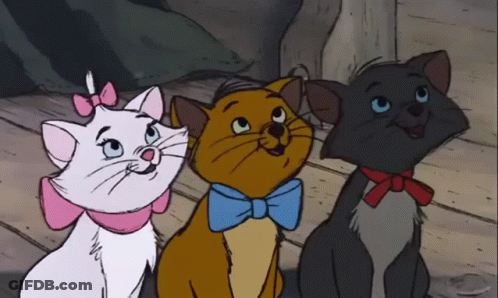 Three Cartoon Cats Are Sitting Next To Each Other With One Wearing A Blue Bow Tie GIF