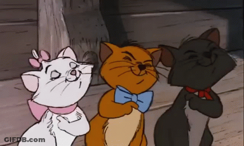 Three Cartoon Cats Are Standing Next To Each Other And One Of Them Is Wearing A Bow Tie GIF
