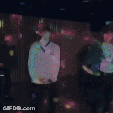 Three Cartoon Characters Dancing In Flower Crowns GIF