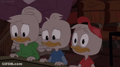 Three Cartoon Ducks Sitting At Table With Kimcartoon GIF