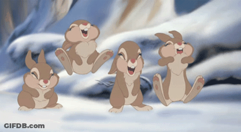 Three Cartoon Rabbits Are Jumping In The Air And Laughing GIF