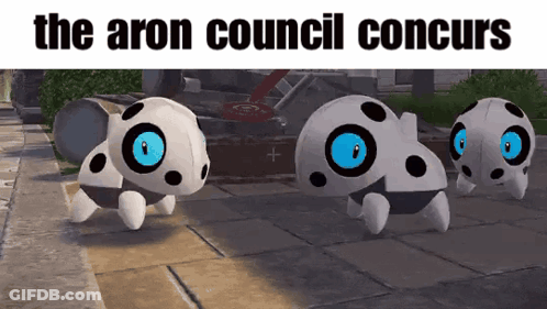 Three Cartoon Turtles With Blue Eyes Are Walking On A Sidewalk With The Caption " The Aron Council Concurs " Above Them GIF