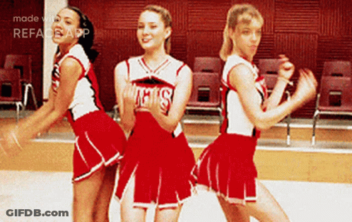 Three Cheerleaders In Red Uniforms GIF
