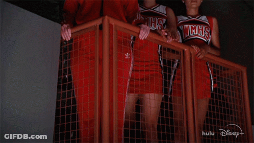 Three Cheerleaders In Red WMHS Uniforms GIF