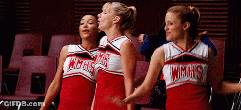 Three Cheerleaders In WMHS Uniforms GIF