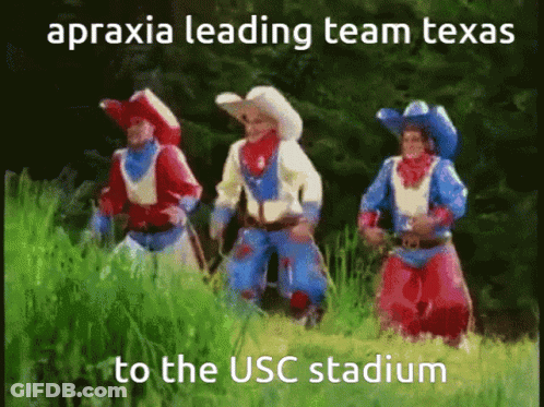 Three Cowboys Leading Team Texas To USC Stadium GIF