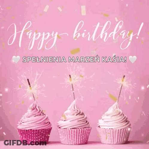 Three Cupcakes With Pink Frosting And Sparklers On A Pink Background GIF