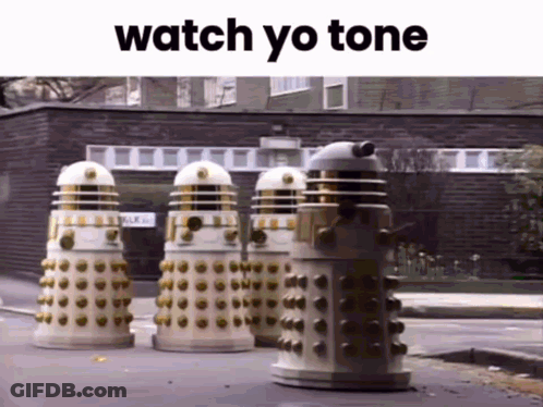 Three Dalek Robots Are Lined Up On A Street With The Words Watch Yo Tone On The Bottom GIF