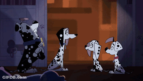 Three Dalmatian Dogs Are Standing Next To Each Other In A Dark Room GIF