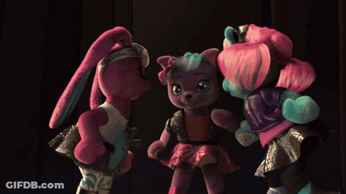Three Dolls Are Standing On A Stage And One Of Them Has A Skull On Her Shoe GIF