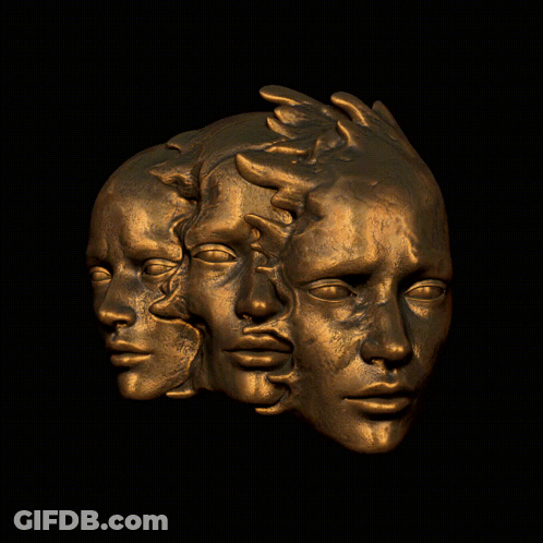 Three-Faced Statue With Hand Coming Out GIF