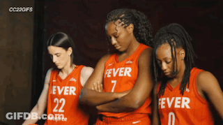 Three Female Basketball Players Wearing Red Uniforms With Fever Written On Them GIF