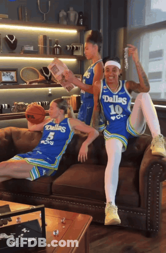 Three Female Dallas Basketball Players Sitting GIF