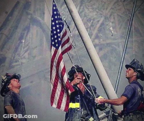 Three Firefighters Raising American Flag GIF