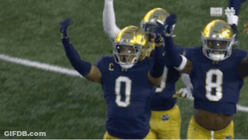 Three Football Players In Jerseys 29 0 And 8 GIF