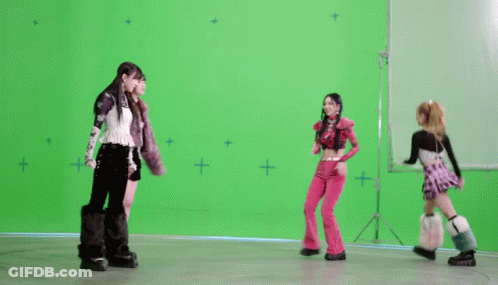 Three Girls Dancing In Front Of Green Screen GIF