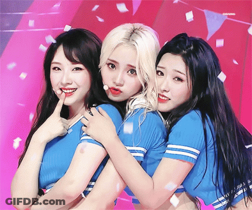 Three Girls Posing One In Blue Striped Shirt GIF