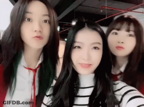 Three Girls Posing Together One Wearing Tie GIF