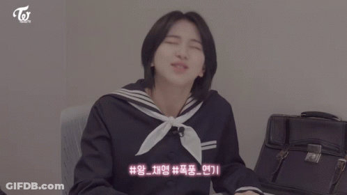Three Girls Sitting At Table With Korean Writing GIF