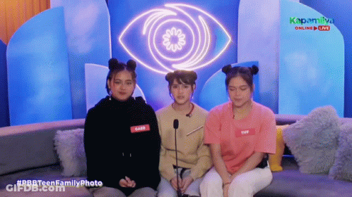 Three Girls Sitting On Couch In Front Of Large Eye #Pbbteenfamilyphoto GIF