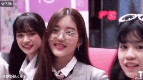 Three Girls Standing Together Smiling GIF