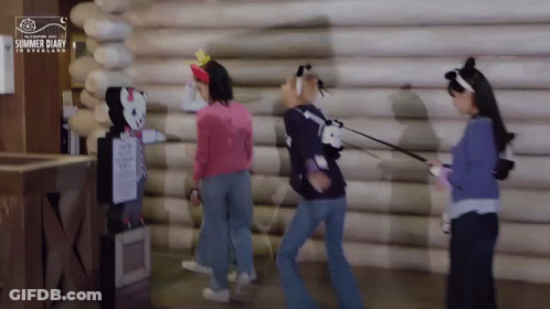 Three Girls Walking In Front Of Summer Diary Sign GIF