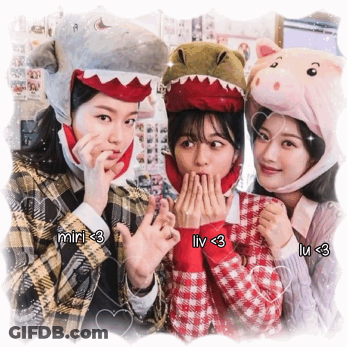 Three Girls Wearing Shark Hats And Pig Hats With Liv < 3 Written On Them GIF