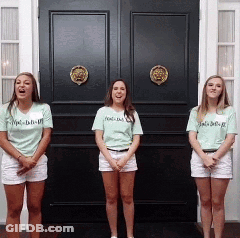 Three Girls Wearing Shirts That Say Alpha Delta Pi Stand In Front Of A Black Door GIF