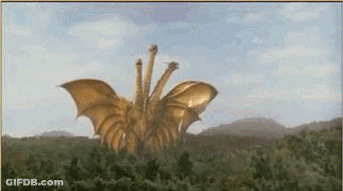 Three-Headed Golden Dragon Flying Over Field GIF