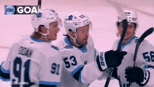 Three Ice Hockey Players Celebrating Goal With Utah GIF