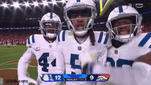 Three Indianapolis Colts Players Celebrate A Touchdown Against Broncos GIF
