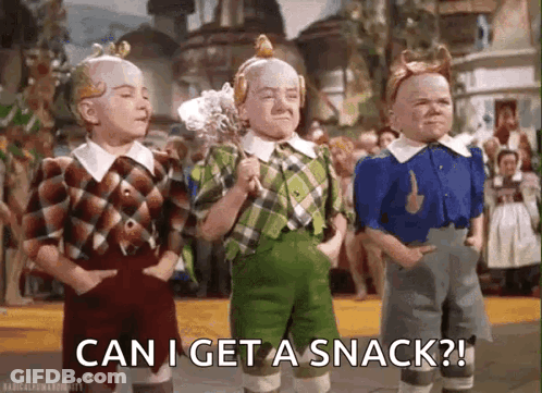 Three Little Boys From The Wizard Of Oz Are Standing Next To Each Other . GIF