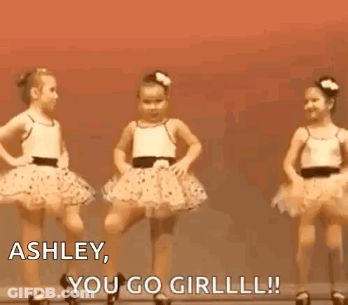 Three Little Girls Are Dancing On A Stage And One Of Them Is Saying `` Ashley , You Go Girl ! '' GIF