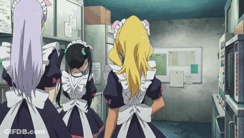 Three Maids Are Standing In A Room With A Calendar On The Wall That Says October GIF