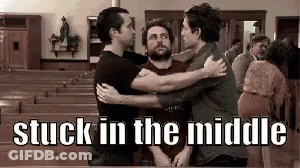 Three Men Are Hugging Each Other In A Church With The Words Stuck In The Middle Above Them . GIF