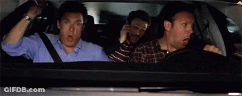 Three Men Are Sitting In A Car With Their Mouths Open And One Of Them Is Screaming . GIF