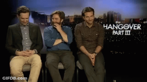 Three Men Are Sitting In Front Of A Hangover Part Iii Sign GIF