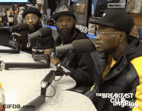 Three Men Are Sitting In Front Of Microphones With The Breakfast Club Written On The Bottom Right GIF