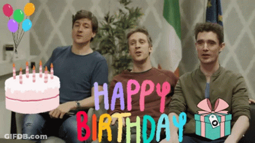 Three Men Are Sitting On A Couch With A Birthday Cake And The Words Happy Birthday Behind Them GIF
