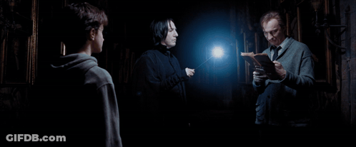 Three Men Are Standing In A Dark Room With The Words Honestly On The Bottom Right GIF