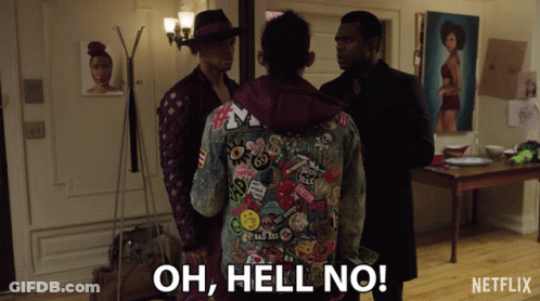 Three Men Are Standing In A Room And One Of Them Is Wearing A Jacket With Stickers On It And Says Oh Hell No GIF